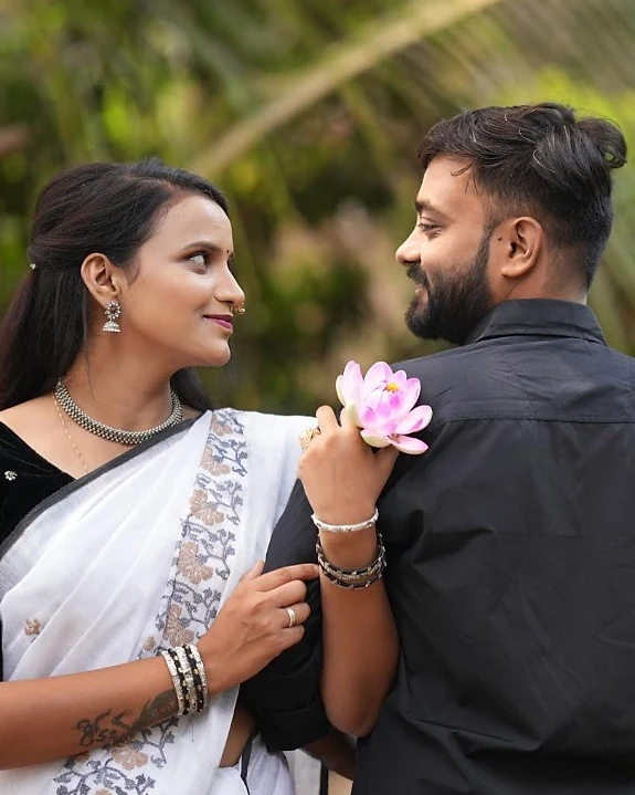 Happy Marathi bride in traditional saree and groom sharing a loving moment - Lagnabandha Matrimony